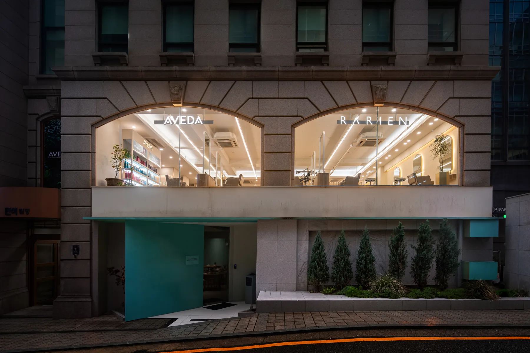 Reception desk with the RARIEN sign · RARIEN Gangnam